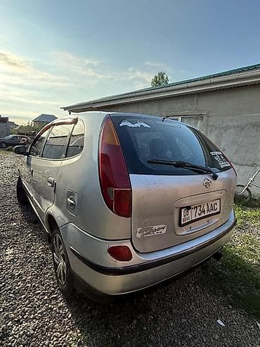 дымится: Nissan Tino: 2002 г., 1.8 л, Автомат, Бензин, Хэтчбэк — 3