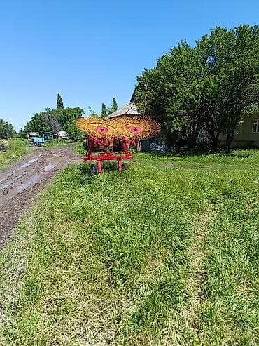 Транспорт: Грабли-ворошилка колесно-пальцевая, прицепная к трактору. - — 2