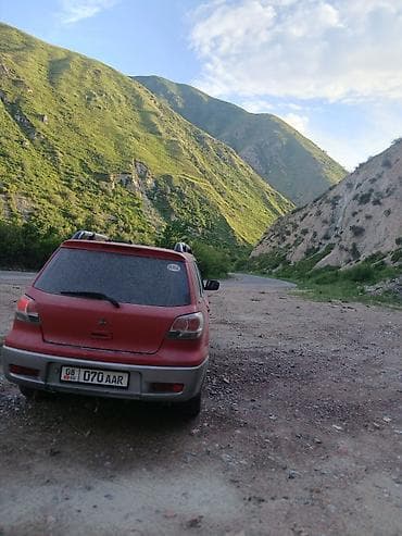 Транспорт: Mitsubishi Airtrek: 2004 г., 2.4 л, Автомат, Бензин, Кроссовер — 4