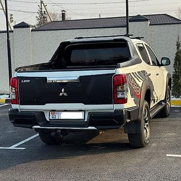 bmw 1 8: Mitsubishi L200: 2023 г., 2.4 л, Механика, Газ, Пикап — 5