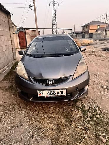 Транспорт: Honda Fit: 2009 г., 1.5 л, Автомат, Бензин, Универсал — 2