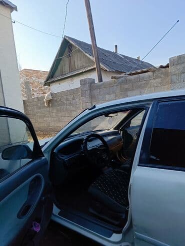 купить запчасти на опель вектра б: Mazda 626: 1992 г., 1.8 л, Механика, Бензиновая, Седан — 7