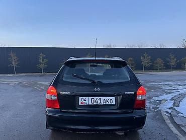 срочно мазда: Mazda 323: 2000 г., 1.8 л, Механика, Бензин, Универсал — 5