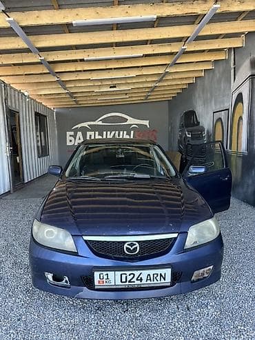 Mazda 323: 2002 г., 2 л, Механика, Бензин, Хэтчбэк at lalafo.kg Mazda 323: 2002 г., 2 л, Механика, Бензин, Хэтчбэк