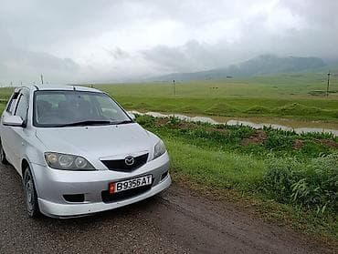 Mazda Demio: 2004 г., 1.5 л, Автомат, Бензин, Хэтчбэк