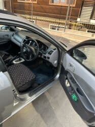 буу автомат машина: Nissan Wingroad: 2003 г., 1.5 л, Автомат, Газ, Универсал — 6