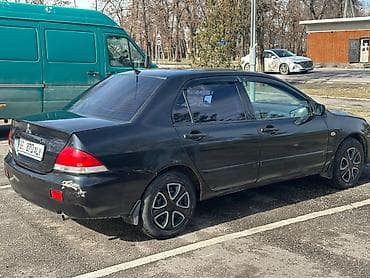 honda capa: Mitsubishi Lancer: 2006 г., 1.6 л, Механика, Бензин, Седан — 9