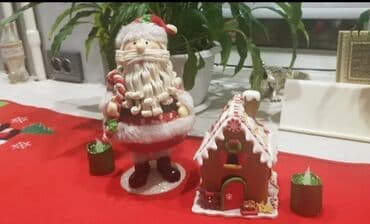 Дед мороз на пружине, пряничный домик и свечи