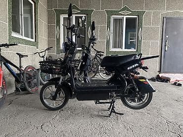 Электроскутер GTA, городского типа, черный. Особенности и оснащение