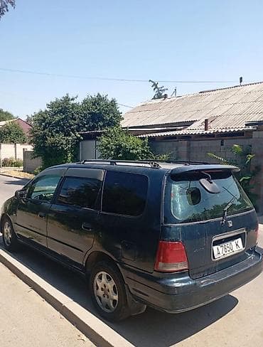 разбитые авто: Honda Odyssey: 1995 г., 2.2 л, Автомат, Бензин, Минивэн — 3