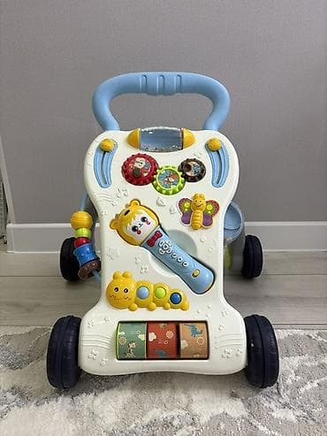 Детские ходунки: Развивающая каталка-ходунки для малышей - Устойчивая конструкция на 4 — 1