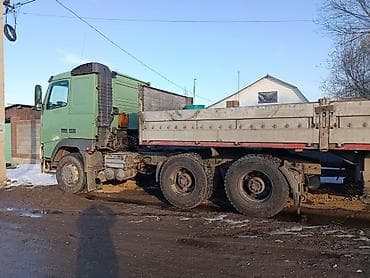 от солнца: Тягач, Volvo, 2001 г., Бортовой — 6