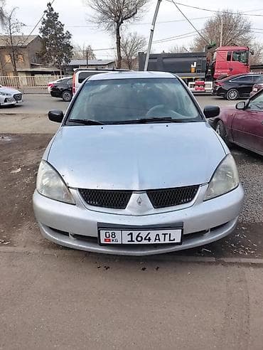 Mitsubishi Lancer: 2005 г., 1.3 л, Механика, Бензин, Седан