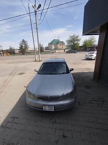 нексия рестайлинг: Седан серебристого цвета, 4 двери, просторный салон, черная тканевая — 5