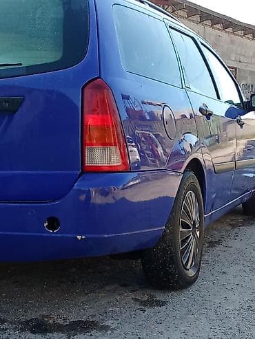 авто выхлоп: Ford Focus: 2000 г., Механика — 6