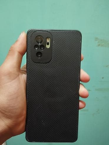 жировой фильтр: Смартфон с защитным карбоновым чехлом и модулем основной камеры с — 1