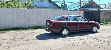 kia clarus: Mitsubishi Carisma: 1997 г., 1.6 л, Автомат, Бензин, Седан — 1