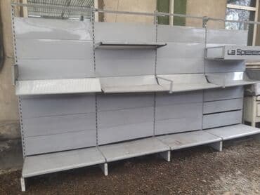 оборудование для бутика: Прадаю стеллажи для торговли в количестве 2 производитель Италия цена — 1