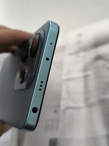 aipad mini 6: Смартфон Redmi Note 14 в голубом цвете — 8