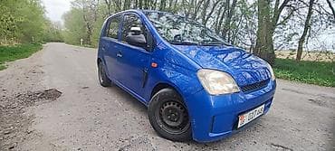 Daihatsu Cuore: 2004 г., 1 л, Ручные, Бензин, Хэтчбэк