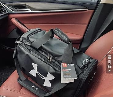 Спортивные сумки: Спортивная сумка Under Armour (серия Storm1), черная - Вместительное — 5