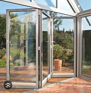 складные металлические двери: Алюминиевые панорамные складные двери «гармошка» для террас, зимних — 1