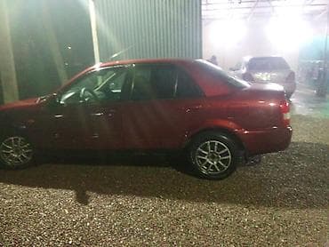 sprinter 412: Mazda 323: 2003 г., 1.6 л, Автомат, Бензин — 4