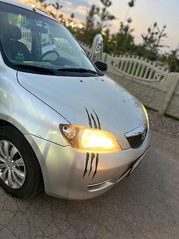 принимаем катализаторы: Mazda 2: 2003 г., 1.3 л, Механика, Бензин, Хэтчбэк — 9