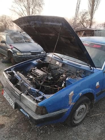 грузовой мазда: Mazda 626: 1989 г., Седан — 4