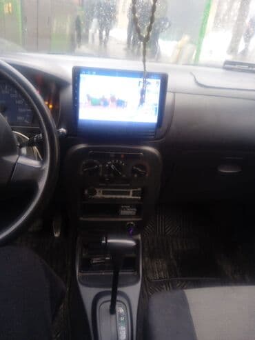 Daihatsu Cuore: 2004 г., 1 л, Автомат, Бензин, Хэтчбэк