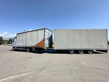 124 amg: Тягач, Volvo, 2001 г., Шторный — 4