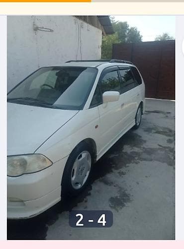 танк самурай: Honda Odyssey: 2000 г., 2.3 л, Газ, Универсал — 4
