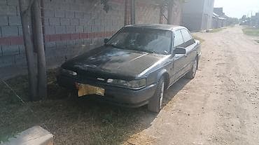 sl 55: Mazda 626: 1988 г., 2 л, Механика, Бензин, Седан — 3