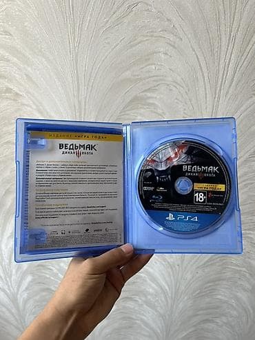Видеоигры и приставки: Игра для PS4: «Ведьмак 3: Дикая Охота — Издание “Игра года”» (диск в — 2
