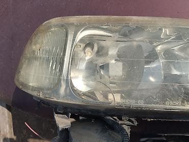 Детали ходовой части: Передняя правая фара Honda — 1