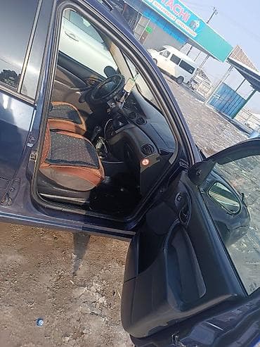 su 7: Ford Focus: 2003 г., 1.6 л, Автомат, Бензин, Универсал — 9