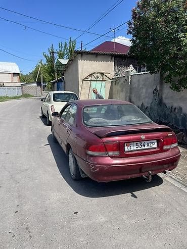 cruiser 80: Mazda Cronos: 1990 г., Седан — 2