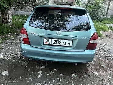 15 демио: Mazda 323: 2002 г., 1.6 л, Механика, Бензин, Хэтчбэк — 1