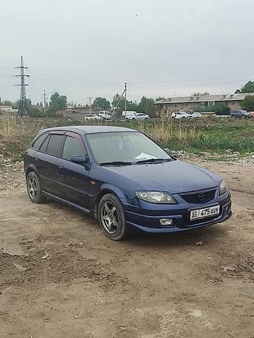 bme e34: Mazda Familia: 2002 г., 1.6 л, Ручные, Универсал — 3