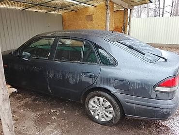 mazda cronos: Mazda 626: 1997 г., 1.8 л, Механика, Седан — 7