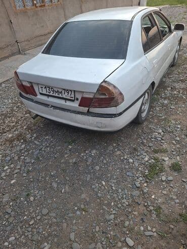 Mitsubishi Lancer: 1999 г., 1.6 л, Автомат, Бензин, Седан