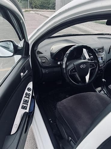 spark 2012: Hyundai Solaris: 2015 г., 1.4 л, Автомат, Бензин, Седан — 5