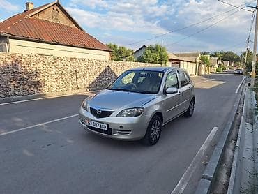 Транспорт: Mazda Demio: 2003 г., 1.5 л, Автомат, Бензин, Хэтчбэк — 2