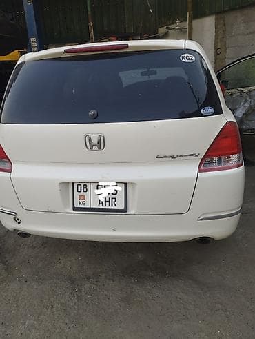 семейный авто: Honda Odyssey: 2004 г., Автомат, Бензин, Минивэн — 4