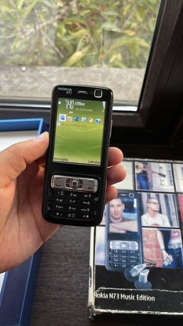 простые телефоны: Nokia N73, Б/у, < 2 ГБ, цвет - Черный, 1 SIM — 1