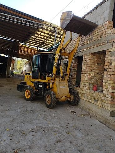 su 7: Погрузчик, Колесный, Фронтальный — 2