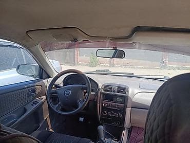 mazda 626 кронос: Mazda 626: 2001 г., 2 л, Механика, Дизель, Хэтчбэк — 5