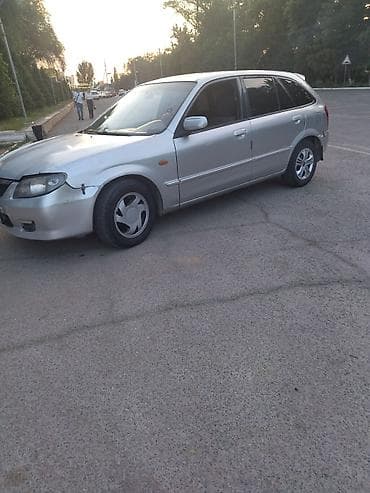 кия рио 2003: Mazda 323: 2003 г., 1.6 л, Механика, Бензин, Хэтчбэк — 4