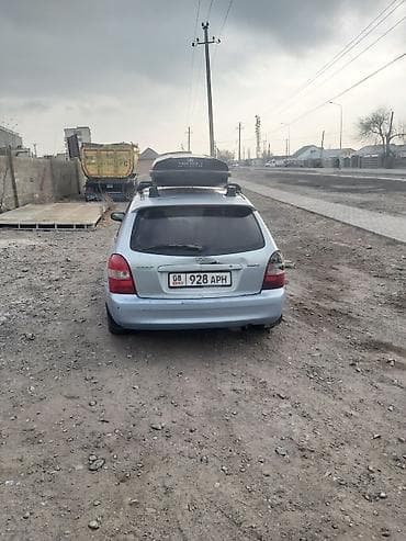 Mazda: Mazda 323: 2001 г., 1.6 л, Механика, Бензин, Универсал — 3