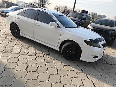 тюнинг салона: Автомобиль – седан, салон серо‑бежевый, тканевая обивка. Особенности — 4